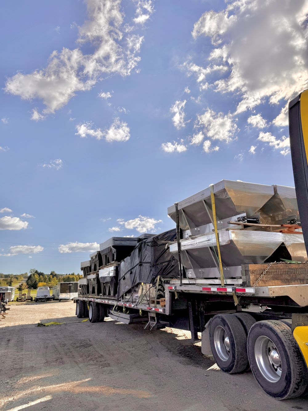 Semi Truck full of salt spreaders